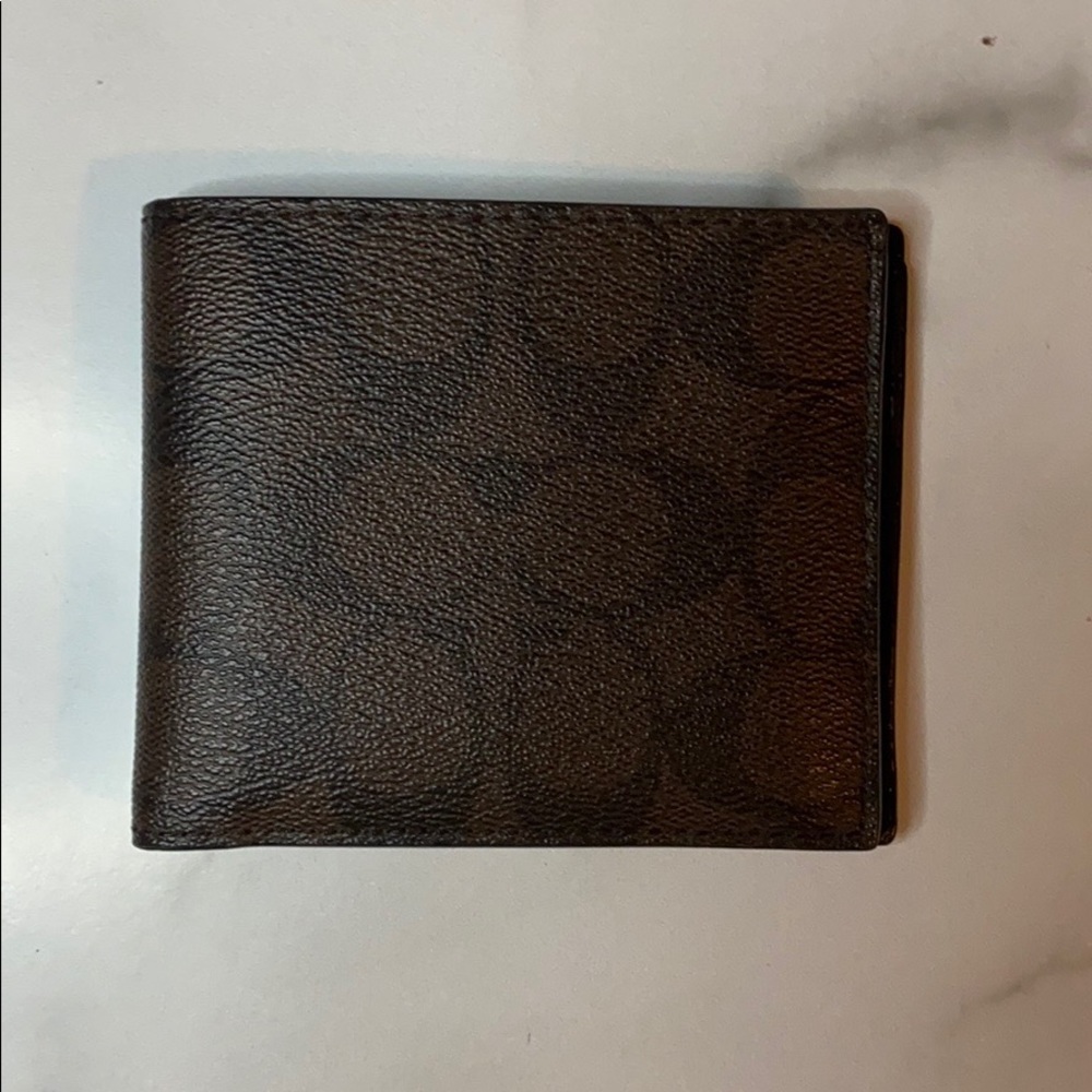 Men’s Coach Wallet.